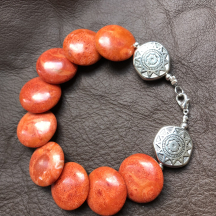 Korallenarmband Sonnensymbol